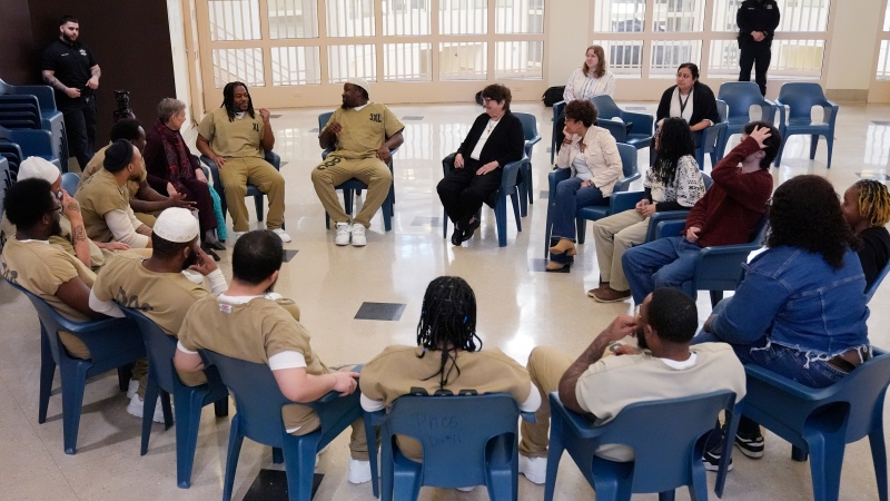 Detainees, DePaul students, and Sister Helen Prejean attend a book club at Department Of Corrections Division 11 in Chicago, Monday, April 22, 2024. (AP Photo/Nam Y. Huh)