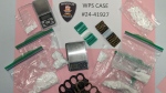 Officers seized 61 grams of cocaine, 47 unknown pills, two digital scales, and packaging material. (Source: Windsor police)