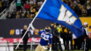 Winnipeg Blue Bombers running back Andrew Harris (33) takes the field ahead of first half football action against the Hamilton Tiger-Cats in the 108th CFL Grey Cup in Hamilton, Ont., on Sunday, December 12, 2021. Harris will retire as a member of the Winnipeg Blue Bombers on April 27, 2024.  (THE CANADIAN PRESS/Ryan Remiorz)
