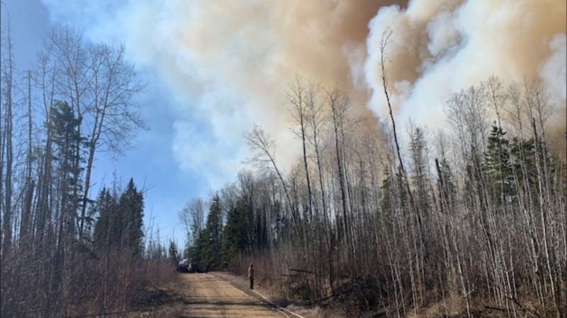 Smoke billows from Wildfire MWF012, located approximately 4.5 kilometres east of Saprae Creek Estates in the Fort McMurray forest area, in April 2024. (Source: Alberta Wildfire) 