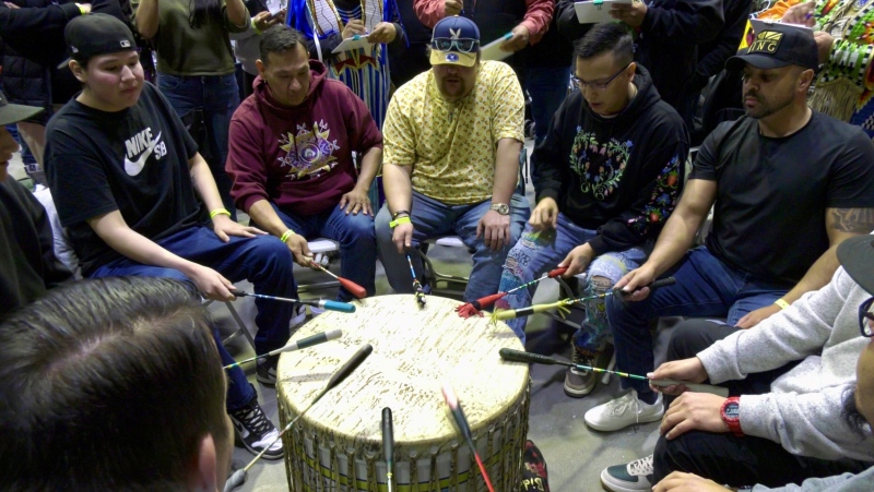 The Thunder Dancing Horse drum group just before they perform at the FNUniv Powwow. (Mick Favel / CTV News)