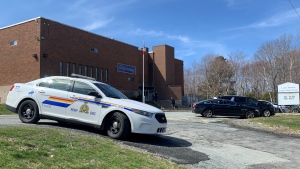 An RCMP cruiser is pictured outside Leslie Thomas Junior High School in Lower Sackville, N.S., on April 24, 2024. (Mike Lamb/CTV Atlantic)