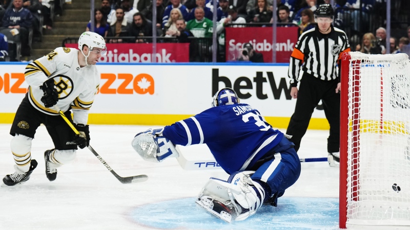Boston Bruins' Jake DeBrusk (74) scores on Toronto Maple Leafs goaltender Ilya Samsonov (35) during third period action in Game 3 of an NHL hockey Stanley Cup first-round playoff series in Toronto on Wednesday, April 24, 2024. THE CANADIAN PRESS/Nathan Denette