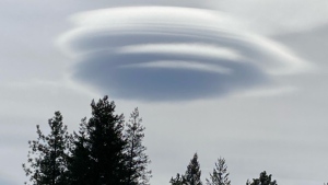 Is that a spaceship? Nope. But many call this type of cloud a "flying saucer cloud." The actual term is lenticular cloud. Super cool to see. Thanks to Janet Schmidt, who took this at Wildstone Golf Course in Cranbrook.
