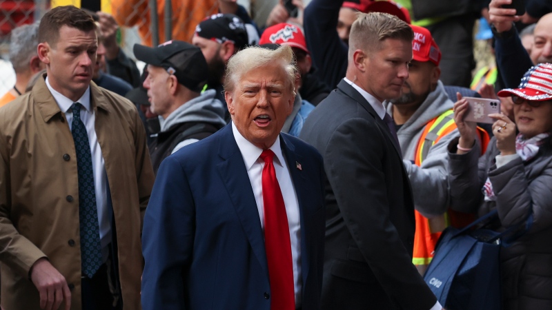 Former President Donald Trump reacts while meeting with construction workers at the construction site of the new JPMorgan Chase headquarters in midtown Manhattan, New York on Thursday, April 25, 2024. (AP Photo/Yuki Iwamura)