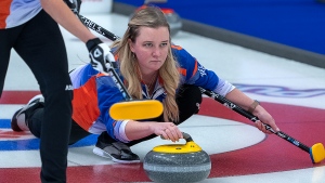 Chelsea Carey delivers a rock during a match against New Brunswick at the Scotties Tournament of Hearts at Fort William Gardens in Thunder Bay, Ont., Thursday, Feb. 3, 2022. Carey announced she will be taking over as skip for Jennifer Jones' rink for the next two seasons. (THE CANADIAN PRESS/Andrew Vaughan)