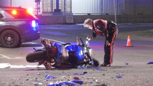 Calgary police investigate a motorcycle and car crash on 32 Avenue and Sixth Street N.E. on Tuesday, April 23, 2024. 