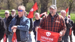 A crowd of former Wescast employees and supporters rally outside Wescast Industries in Wingham on April 25, 2024. (Scott Miller/CTV News London)