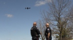 Guelph police officers use their new drone. (CTV News/Colton Wiens)