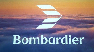 Bombardier logo is revealed during a ceremony at their plant, Wednesday, April 24, 2024 in Montreal. (Ryan Remiorz/The Canadian Press)