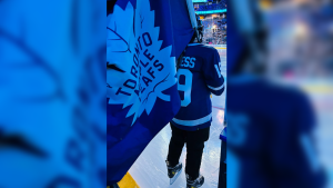 12-year-old Madison Maness was the flag carrier at Toronto Maple Leafs’ playoff game against the Boston Bruins at Scotiabank Arena on April 25, 2024. (Photos courtesy of Jamie and Stephanie Maness)