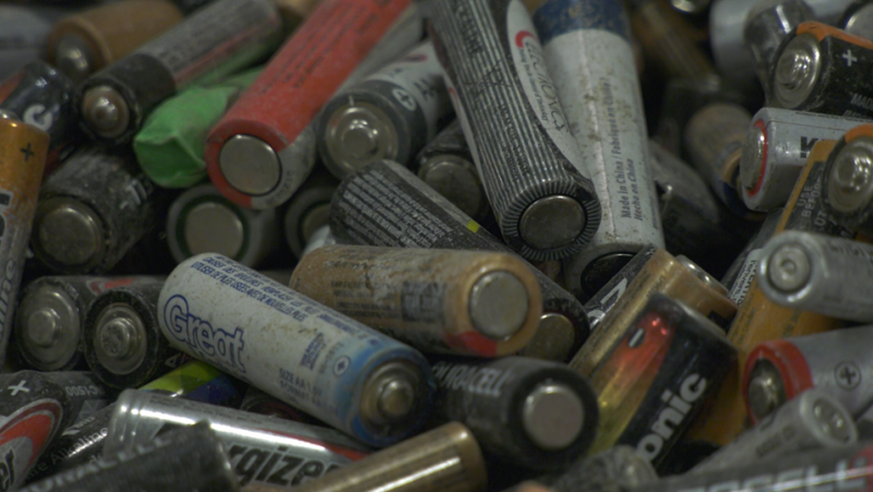 Used batteries at the Electronic Distributors International (EDI) battery sorting line in Orillia, Ont. on April, 25, 2024. (CTVNews/Mike Lang)