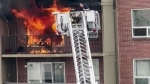 Man rescued from burning apartment