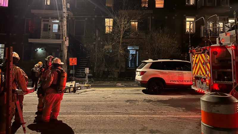 A fire in Montreal's Sainte-Marie neighbourhood resulted in a woman being transported to the hospital in critical condition. Her condition has since stabilized. (Cosmo Santamaria, CTV News)