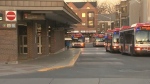Shuttle buses are shown outside Jane Station during a service interruption on April 26.