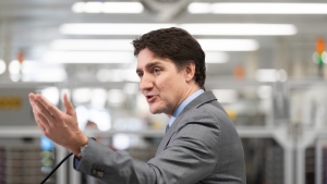 Prime Minister Justin Trudeau speaks to the media following a tour at IBM in Bromont, Que., Friday, April 26, 2024. (Christinne Muschi/The Canadian Press)
