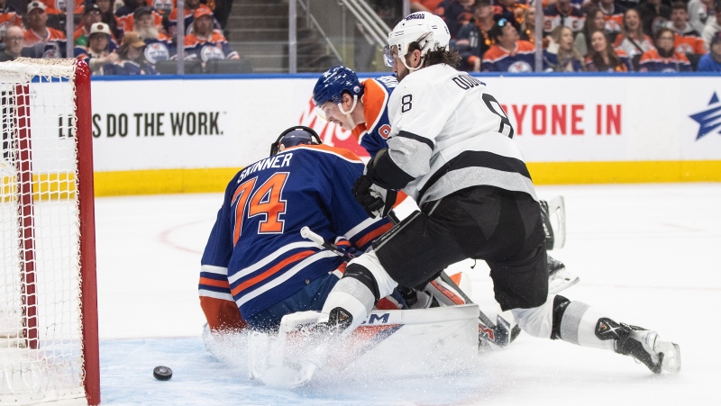 Los Angeles Kings' Drew Doughty (8) scores a goal on Edmonton Oilers goalie Stuart Skinner (74) during first period NHL playoff action in Edmonton on Wednesday April 24, 2024.THE CANADIAN PRESS/Jason Franson