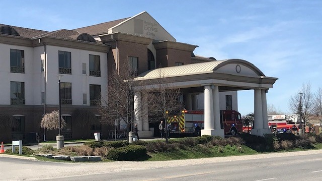 Fire crews are seen outside the former Holiday Inn Express in Guelph on April 26, 2024. (Dave Pettitt/CTV Kitchener) 