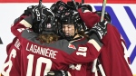 Players from Montreal's Women's Professional Hockey League celebrate a goal against Minnesota, Sunday, February 18, 2024 at Place Bell, Laval. (Graham Hughes/The Canadian Press)
