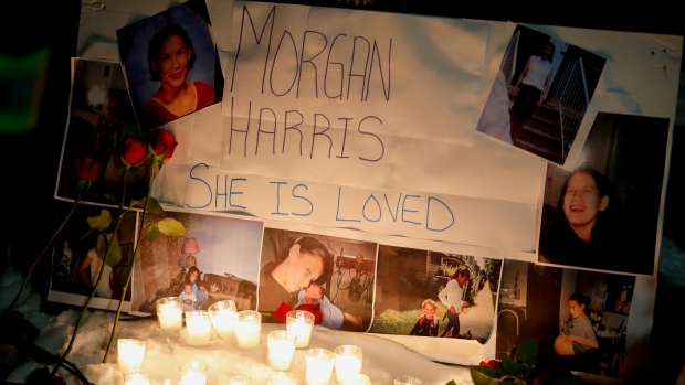 A memorial with photos of Morgan Harris attached is shown as family and friends of three women who were killed gather at a vigil in Winnipeg, Thursday, December 1, 2022. It was announced that Jeremy Skibicki faces three more charges of first-degree murder. In addition to Rebecca Contois, who was identified earlier, Skibicki has been charged in the deaths of Morgan Beatrice Harris, Marcedes Myran, and an unidentified female. (John Woods/The Canadian Press).