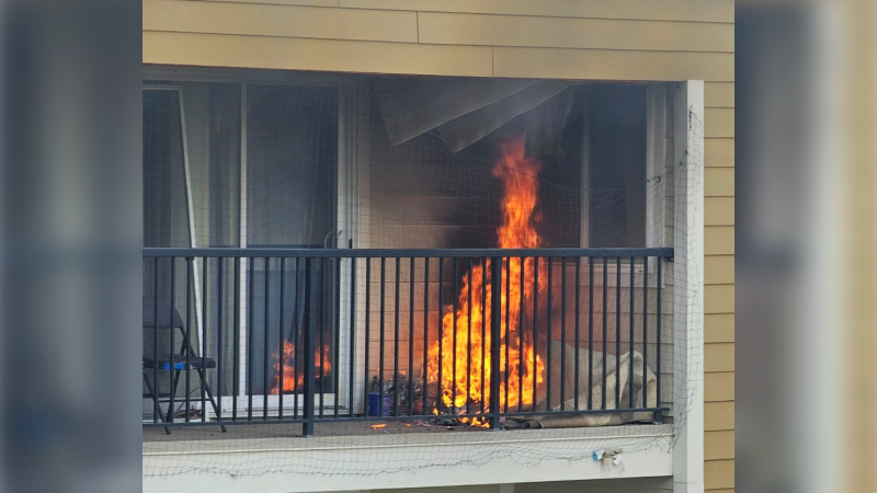 Picture of fire burning in a third story apartment in Dawson Creek courtesy of Rosealie Foster.