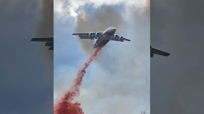 Firebomber flies over Wildmare Creek wildfire (Courtesy: Chetwynd Volunteer Fire Department) 