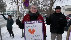 SEIU-West members of LutherCare Communities group home rallied outside their employer’s head office on Feb. 14, 2024. (Chad Hills/CTV News) 