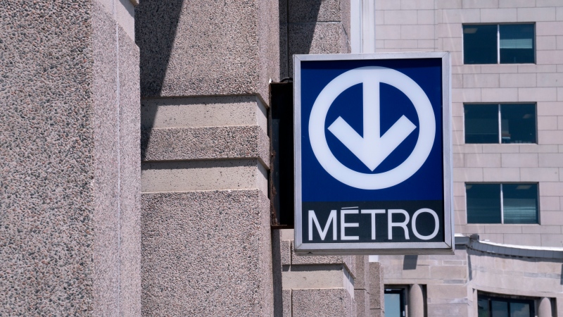 A direction sign to the Metro subway,is seen in Montreal on Tuesday, June 18, 2019. Montreal says public transit trips were up between 15 and 20 per cent among people age 65 and over in the six months after it made the service free for local seniors. THE CANADIAN PRESS/Paul Chiasson
