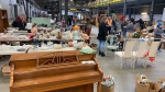 Furniture fills the Ukrainian Newcomer Free Furniture Warehouse on it's second-last day April 27, 2024. (Galen McDougall/CTV News Edmonton) 
