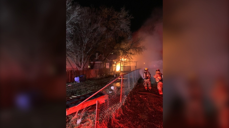 Regina Fire personnel responding to a house fire on the 900 block of Raw Street on April 27, 2024. (Courtesy: Regina Fire)