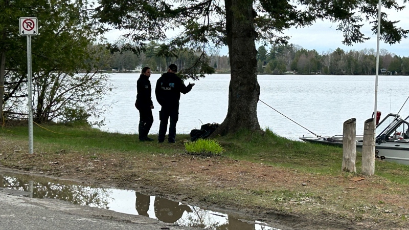 Police search for a missing person in Lake St. George, north of Orillia, on April 28, 2024 (Steve Mann/CTV News). 