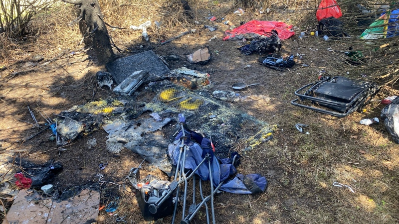 The remnants of a fire in Saint John, N.B., which occurred at an encampment by the corner of Bleury and Simms Street. (Avery MacRae/CTV Atlantic)