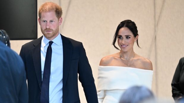 FILE - Britain's Prince Harry, The Duke of Sussex, left, and Meghan, Duchess of Sussex, participate in The Archewell Foundation Parents' Summit "Mental Wellness in the Digital Age" as part of Project Healthy Minds' World Mental Health Day Festival, Oct. 10, 2023, in New York. (Photo by Evan Agostini/Invision/AP, File)
