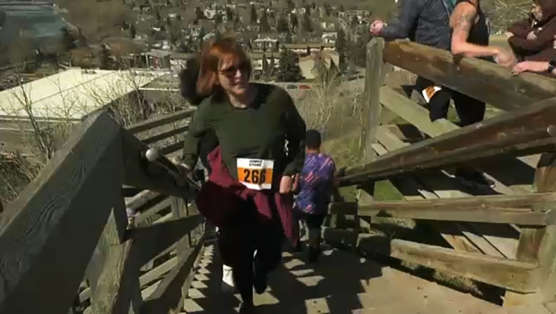 About 300 people raised funds to end homelessness by climbing the stairs at McHugh Bluffs Sunday.
