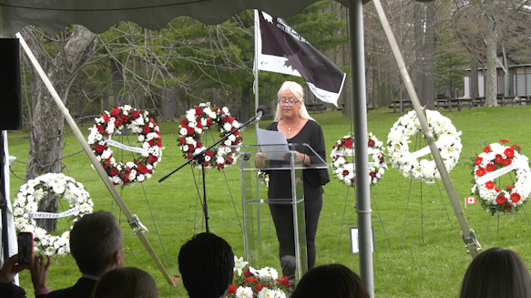 Jennifer Chenier speaks at the National Day of Mourning on Sunday in Ottawa. Chenier’s son Nick was killed on the job in May 2023.