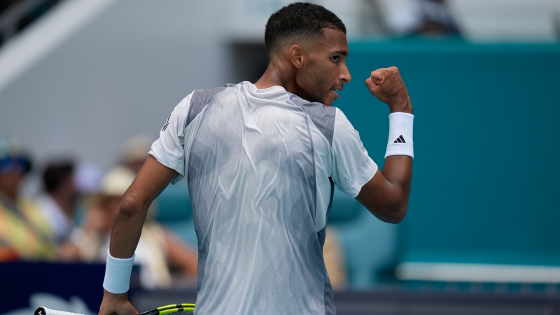 Felix Auger-Aliassime, of Canada, celebrates winning a game over Adam Walton, of Australia, in their men's first round match at the Miami Open tennis tournament, Thursday, March 21, 2024, in Miami Gardens, Fla. (Rebecca Blackwell, The Associated Press)