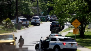 Police work at the scene of a shooting Monday, April 29, 2024, in east Charlotte, N.C. (Khadejeh Nikouyeh/The Charlotte Observer via AP)