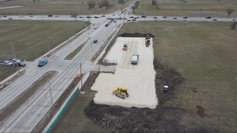 Construction crews working on the new gas bar at Naawi-Oodena, the former site of the Kapyong Barracks, on April 29, 2024. (Jamie Dowsett/CTV News Winnipeg)