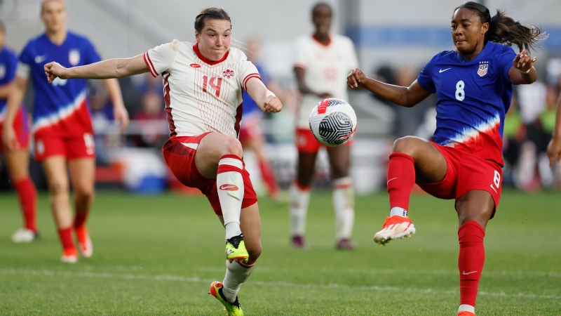 United States' Jaedyn Shaw, right, plays against Canada's Vanessa Gilles during a SheBelieves Cup women's soccer match Tuesday, April 9, 2024, in Columbus, Ohio. (AP Photo/Jay LaPrete) 