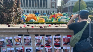 Posters of Israelis kidnapped by Hamas are on the Columbia University campus in New York by a pro-Palestinian protest encampment on Monday, April 29, 2024. (AP Photo/Ted Shaffrey) 