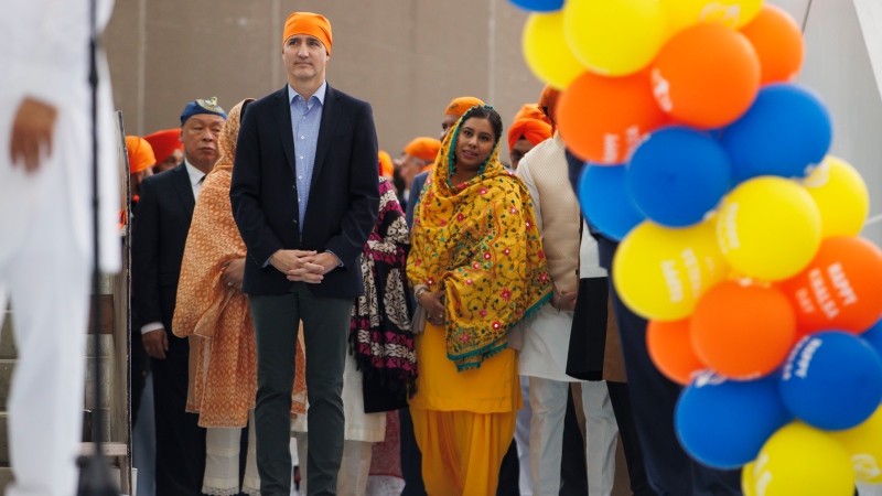 Prime Minister Justin Trudeau waits to speak to a crowd during Khalsa day celebrations at City Hall in Toronto, Sunday, April 28, 2024. THE CANADIAN PRESS/Cole Burston