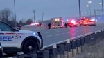Emergency vehicles arrive at the scene of a fatal crash after a wrong-way police chase on Hwy. 401 in Whitby, Ont. 