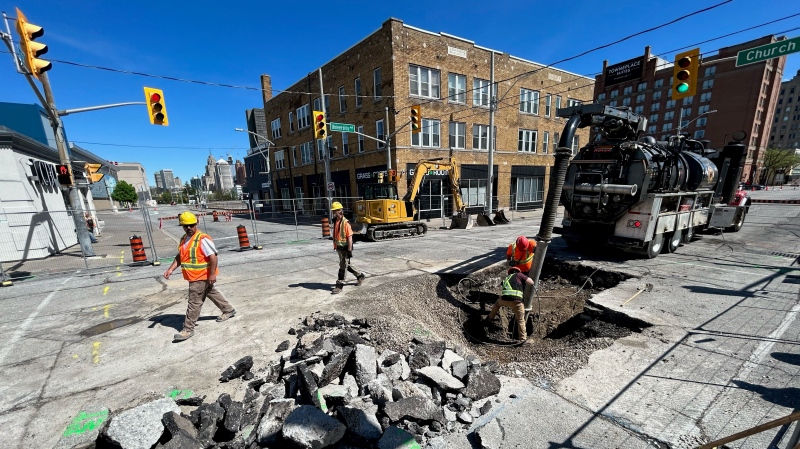 Crews work to repair a sinkhole in downtown Windsor on April 30, 2024. (Rich Garton/CTV News London)