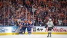 Edmonton Oilers players celebrate a goal as Los Angeles Kings' Alex Laferriere (78) skates past during third period NHL playoff action in Edmonton on Wednesday April 24, 2024. (Jason Franson / The Canadian Press) 