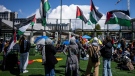 Pro-Palestinian protesters are setting up camps on Canadian universities, demanding those institutions divest from companies with business ties to Israel, over the war in Gaza.<br><Br>
Universities have warned that encampments are not authorized, and protesters may face consequences.<br><br>
<i>People wave flags at the University of British Columbia campus in Vancouver, Monday, April. 29, 2024. THE CANADIAN PRESS/Ethan Cairns</i>