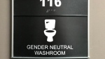 A gender neutral washroom sign is pictured in Saskatoon, SK, Sept.2018. (Jonathan Hayward, The Canadian Press)