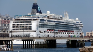 The Norwegian Pearl cruise ship is seen docked at the Black Falcon terminal, Friday, June 30, 2023, in Boston. (AP Photo/Michael Dwyer)