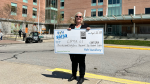 Lorana Wagg from Barrie Ont., won 267 thousand dollars in the 50/50 draw at the Royal Victoria Hospital in support of the Neonatal Intensive Care Unit on April, 25, 2024. (CTVNews/Steve Mann)