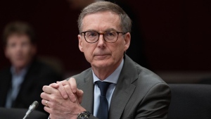 Bank of Canada Governor Tiff Macklem waits to appear before the Senate Finance Committee, in Ottawa, Wednesday, May 1, 2024. THE CANADIAN PRESS/Adrian Wyld