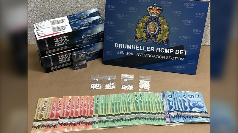 Drugs, cash and illegal tobacco were seized from a Drumheller home during a search warrant execution on April 30, 2024. (Supplied: RCMP) 